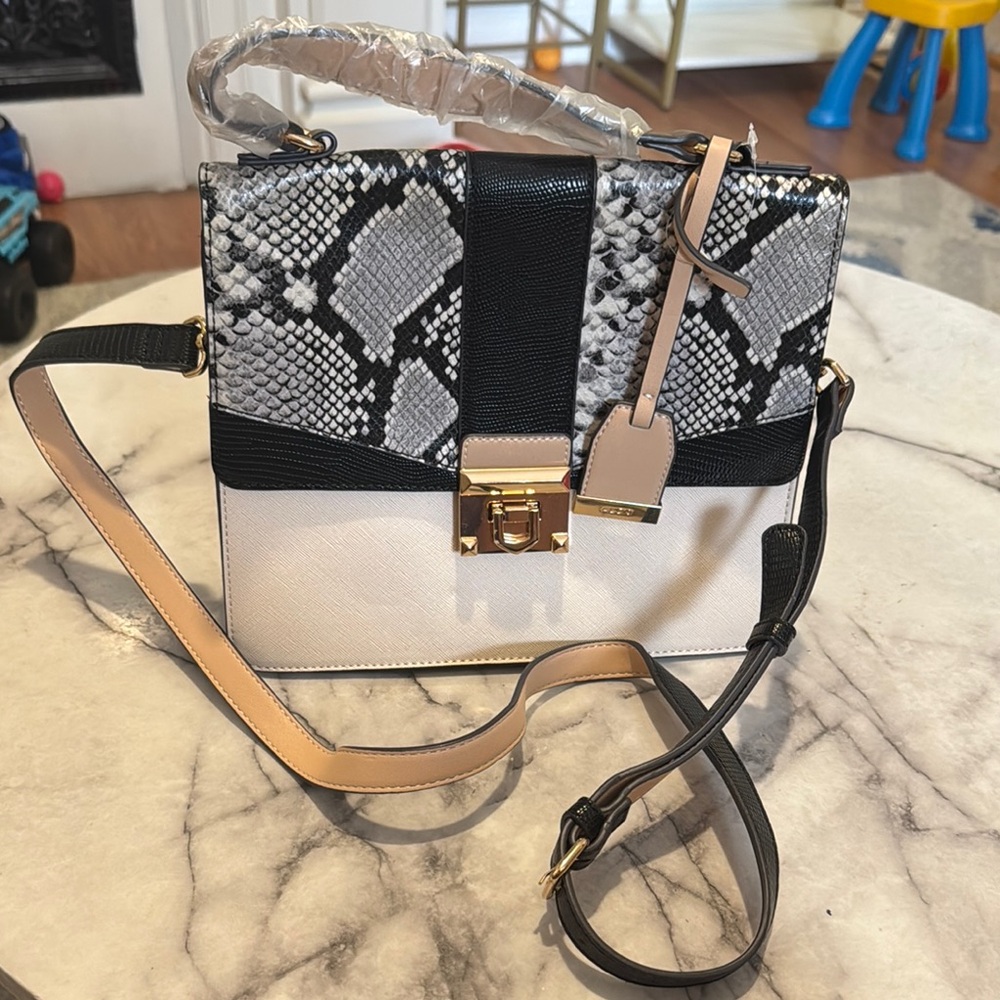 Elegant Black and White Snake Print Handbag